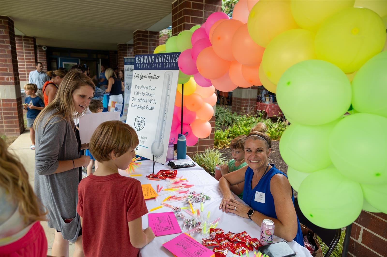 pto smiling at colorful table